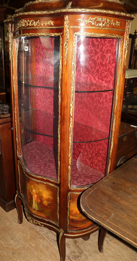 Bow front vitrine